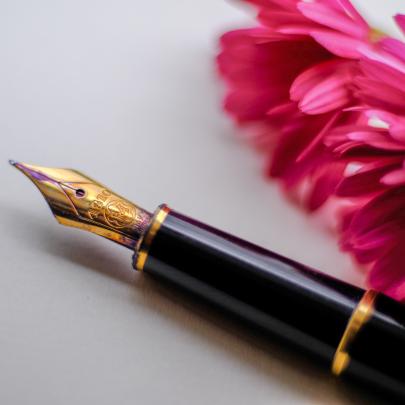 Calligraphy pen with flower