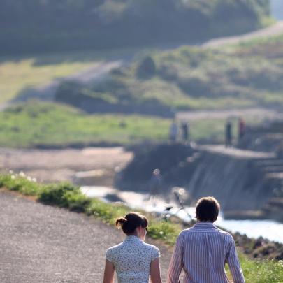 Couple walking on Coastal Path