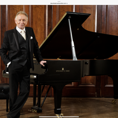 Phil Coulter by his piano