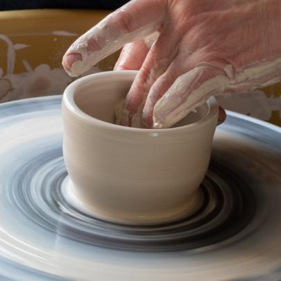 Hand throwing on a potters wheel