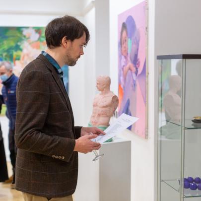 A man browses an exhibition