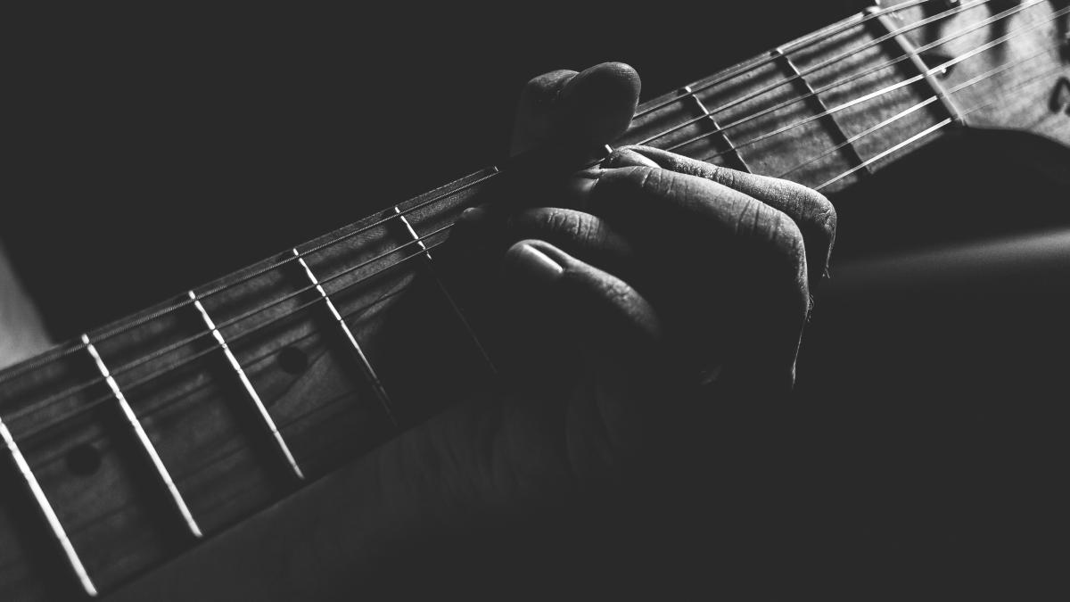 Hand playing guitar 
